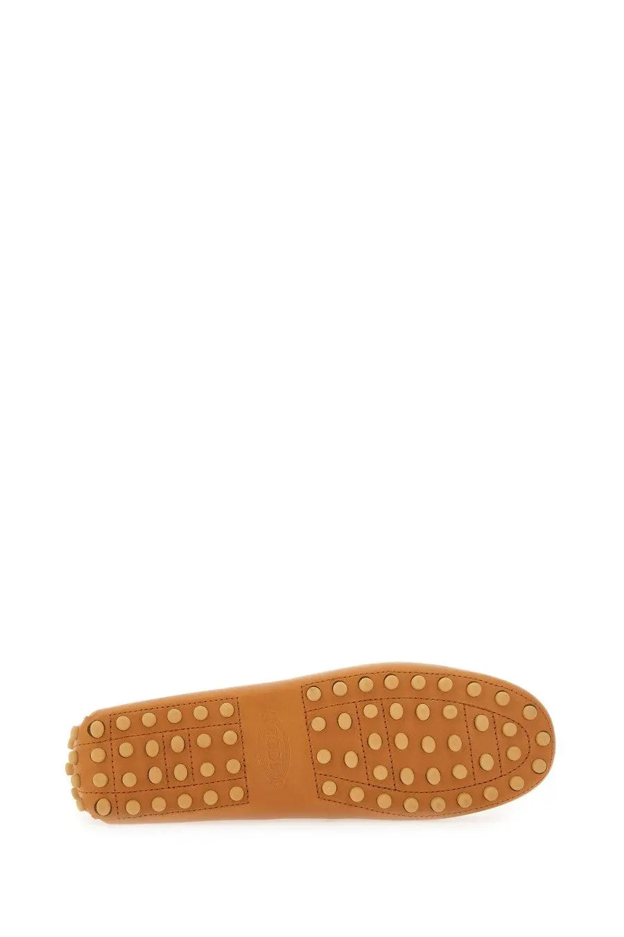 Tod’s women’s leather gommino loafer beige tan driving shoe with textured rubber sole and circular studs
