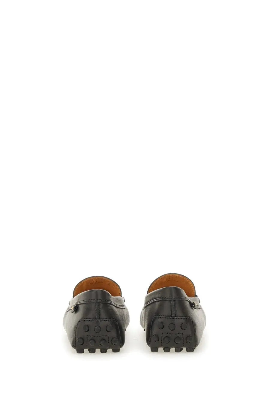 Tod’s women’s leather gommino loafer black with glossy finish and contrasting tan leather lining