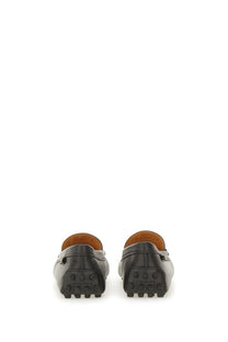Tod’s women’s leather gommino loafer black with glossy finish and contrasting tan leather lining
