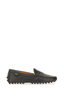 Tod’s women’s black leather gommino loafer with classic moccasin design and textured rubber sole