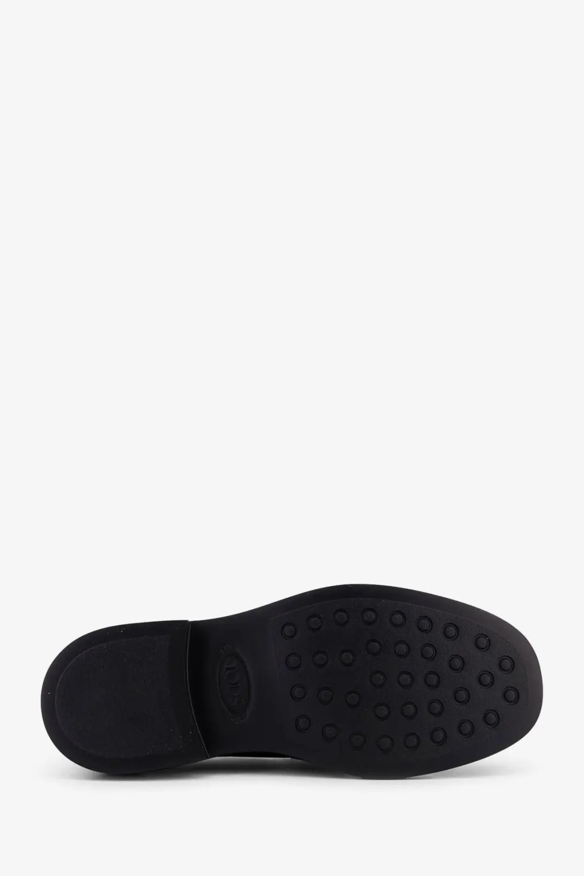 Black rubber sole with circular tread pattern and embossed logo on the back of Tods women’s red leather loafers