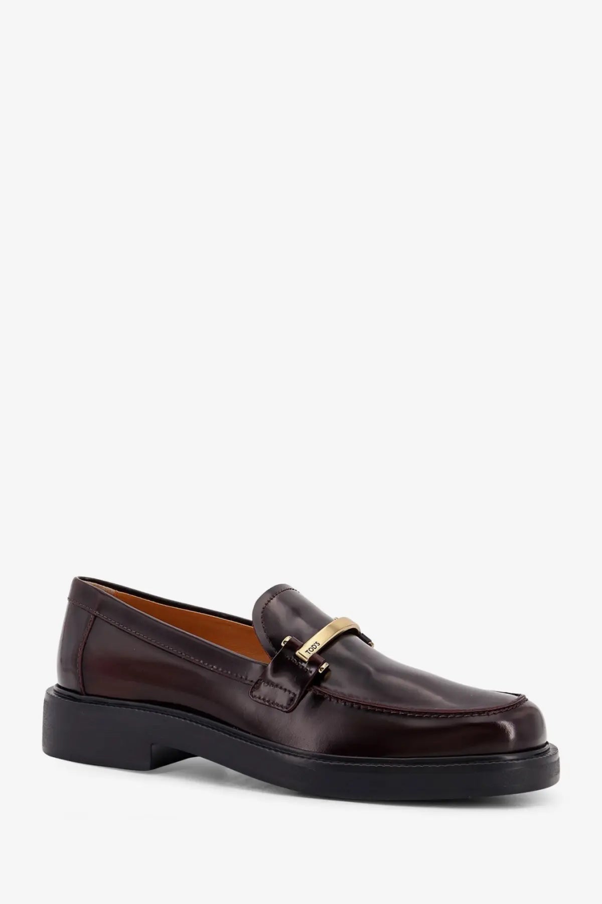 Tod’s women’s red leather loafers with brown leather upper and gold-tone metal buckle detail