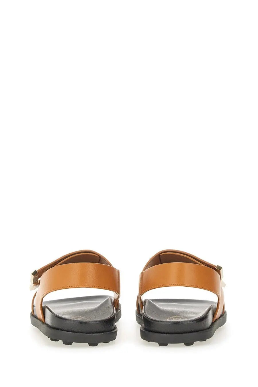 Tod’s women’s leather sandal in brown tan with black rubber sole and gold tone buckle front view