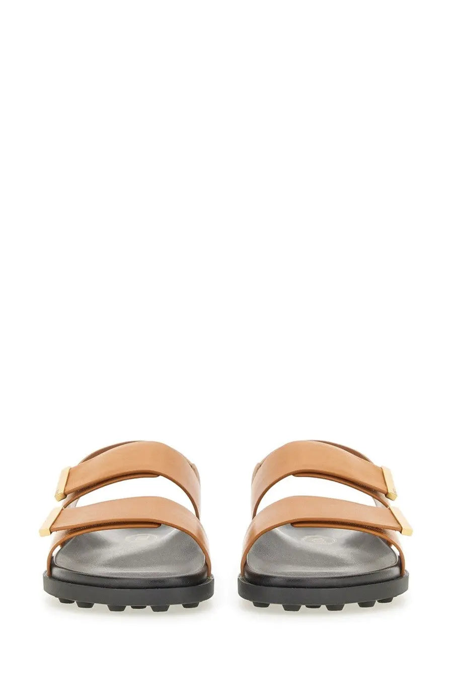 Tod’s women’s tan leather sandals with gold-tone buckle straps and black rubber sole for stylish comfort