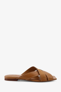 Tod’s women’s brown leather sandals with tan cross-over strap design and visible stitching detail