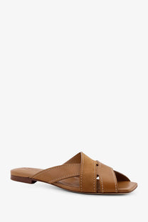 Tod’s women’s leather sandals brown featuring tan leather mule design with low block heel and crisscross straps