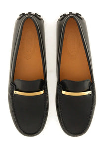 Tod’s women’s moccasin rubbermaid black patent leather loafers with gold-tone metal bar and stitched detailing