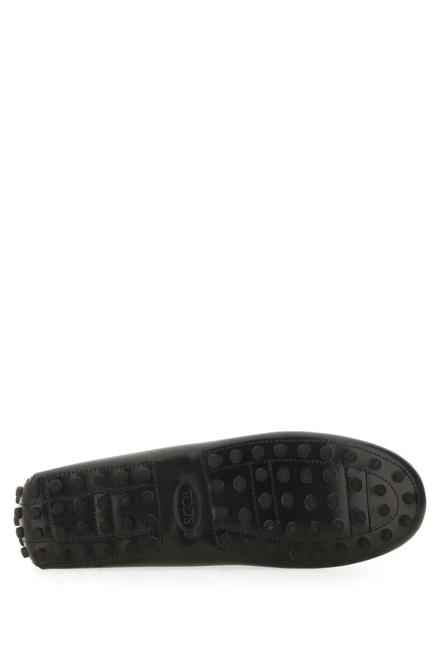 Tod’s women’s moccasin rubbermaid black featuring a black rubber sole with textured tread and embossed brand logo