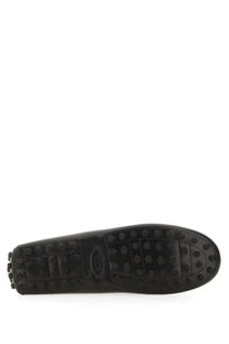 Tod’s women’s moccasin rubbermaid black featuring a black rubber sole with textured tread and embossed brand logo