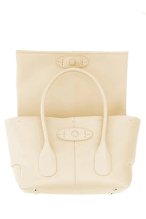 Cream-colored leather tote bag with rounded handles and oval metal hardware by Tod’s reverse small di bag white