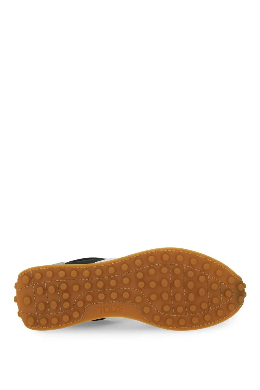 Tan rubber sole with circular tread and stitched edges embossed with loewe on tod’s women’s vintage sneaker grey back side