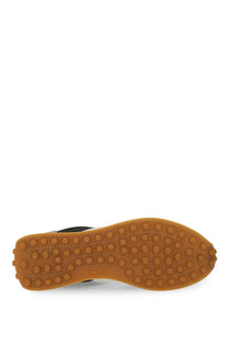 Tan rubber sole with circular tread and stitched edges embossed with loewe on tod’s women’s vintage sneaker grey back side