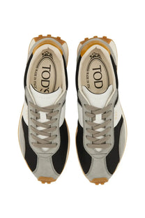 Tod’s women’s vintage sneaker grey black and grey suede with tan rubber soles front view