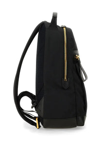 Tom Ford men’s black nylon backpack with gold-tone zippers and leather accents for stylish carrying