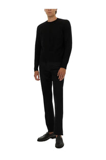 Tom Ford men’s black cashmere crewneck sweater with long sleeves and a smooth fitted silhouette