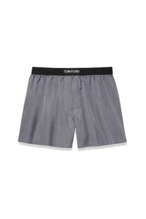 Gray tom ford men’s cotton boxer briefs with black elastic waistband featuring white logo for comfortable wear