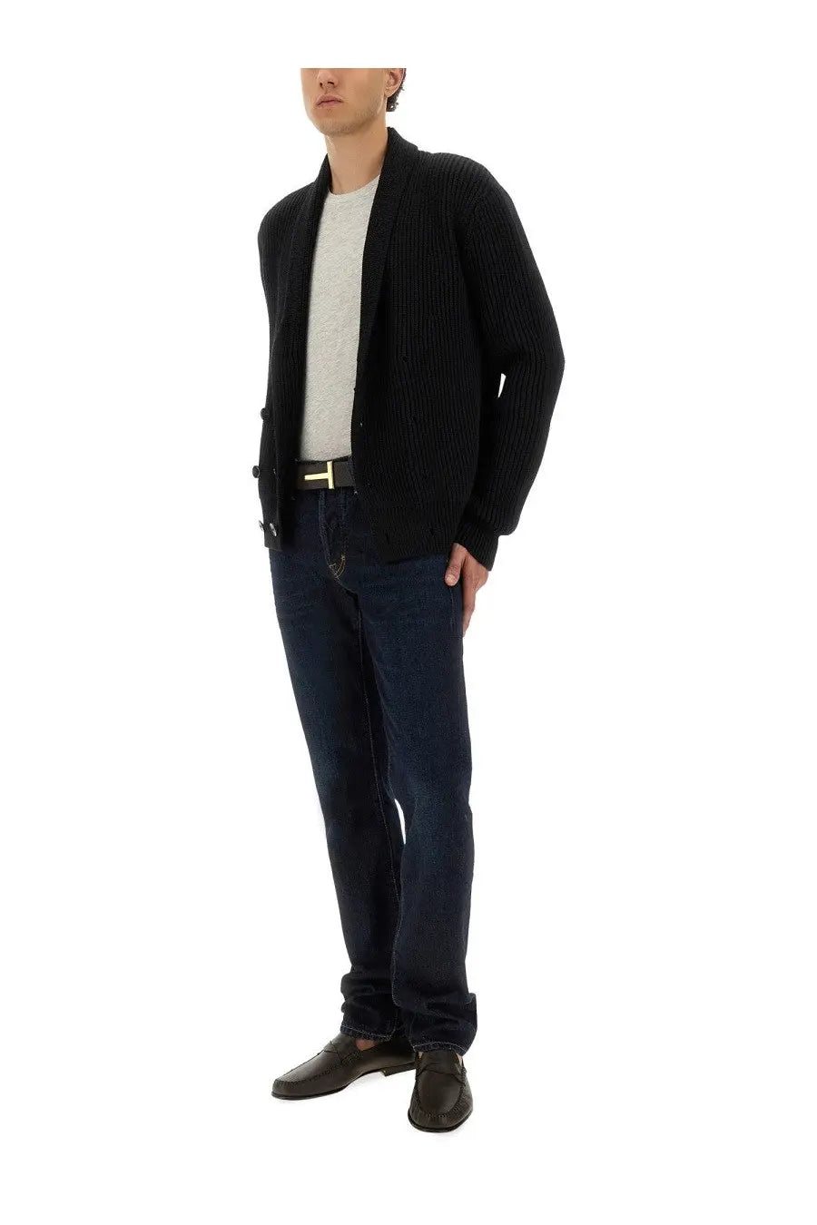 Tom Ford men’s double breasted black ribbed knit cardigan worn over white tee and dark blue jeans