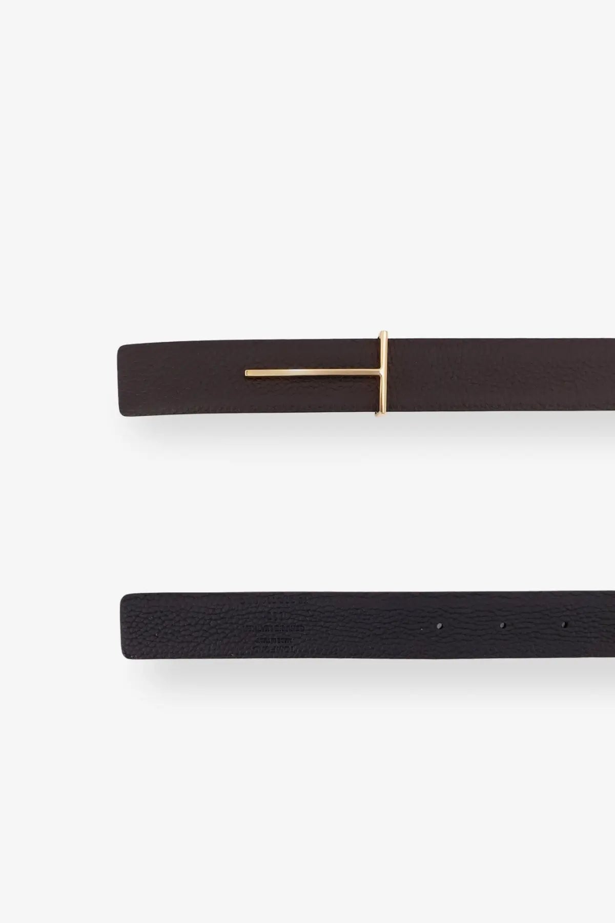 Tom Ford men’s black leather belt with a minimalist gold-tone t buckle and hammered texture