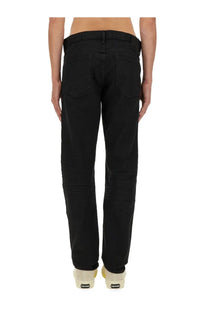 Back side of tom ford men’s denim blue jeans in black denim with straight-leg cut and rear pockets