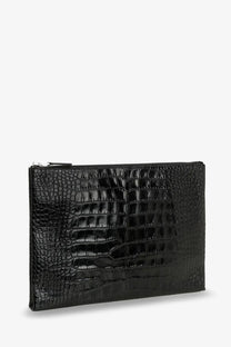 Tom Ford men’s black leather clutch with black crocodile embossing, glossy finish, and silver zipper detail