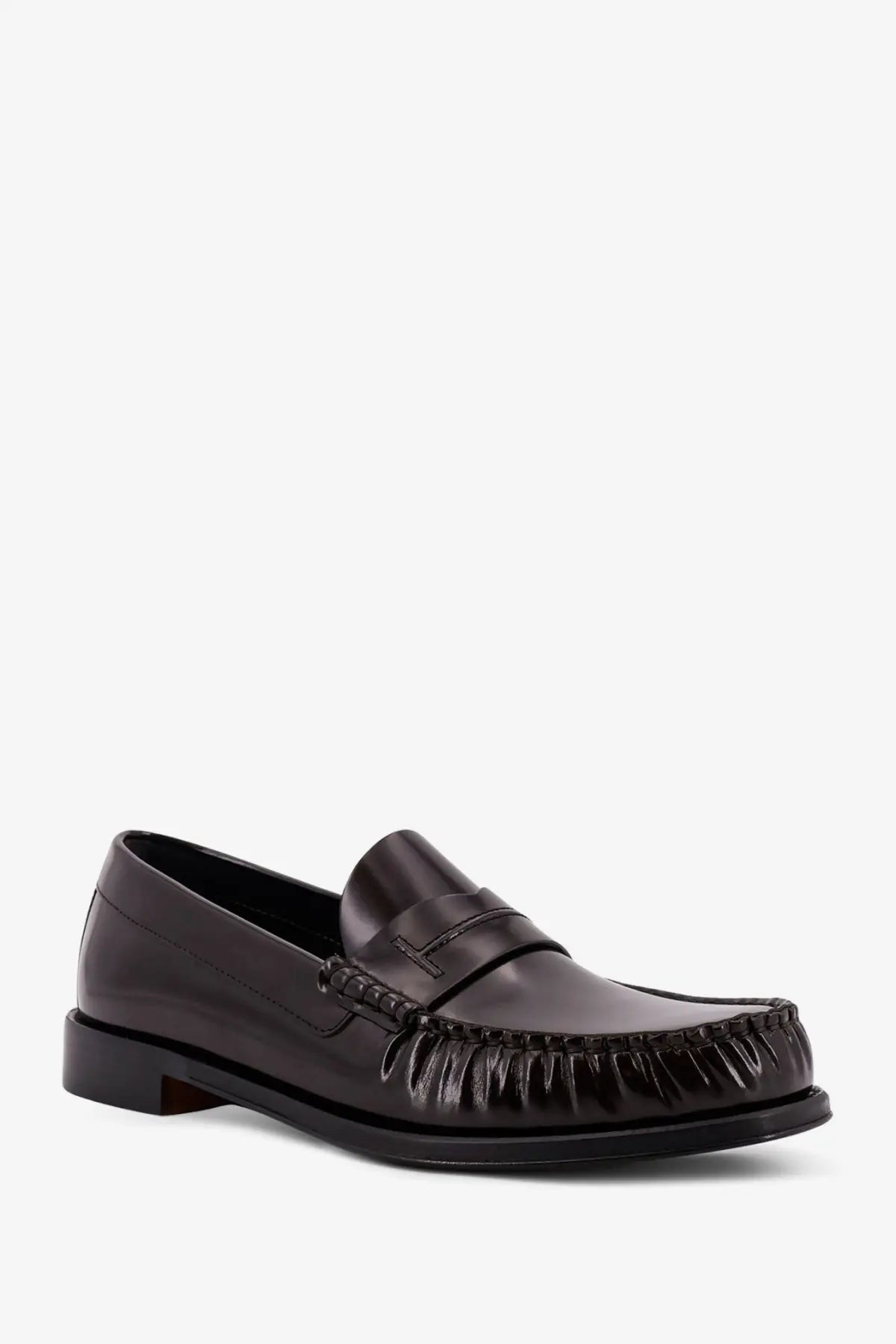 Tom Ford men’s brown leather loafer with black patent leather moccasin featuring fringed toe and stitched detailing