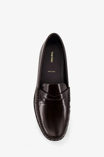 Tom ford men’s dark brown leather loafers with polished finish and braided detailing along the sides