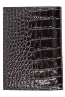 Tom Ford men’s brown leather passport holder featuring black crocodile embossing for stylish travel use