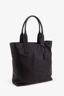 Tom Ford men’s black leather tote bag with structured handles and minimalist design for shopping use
