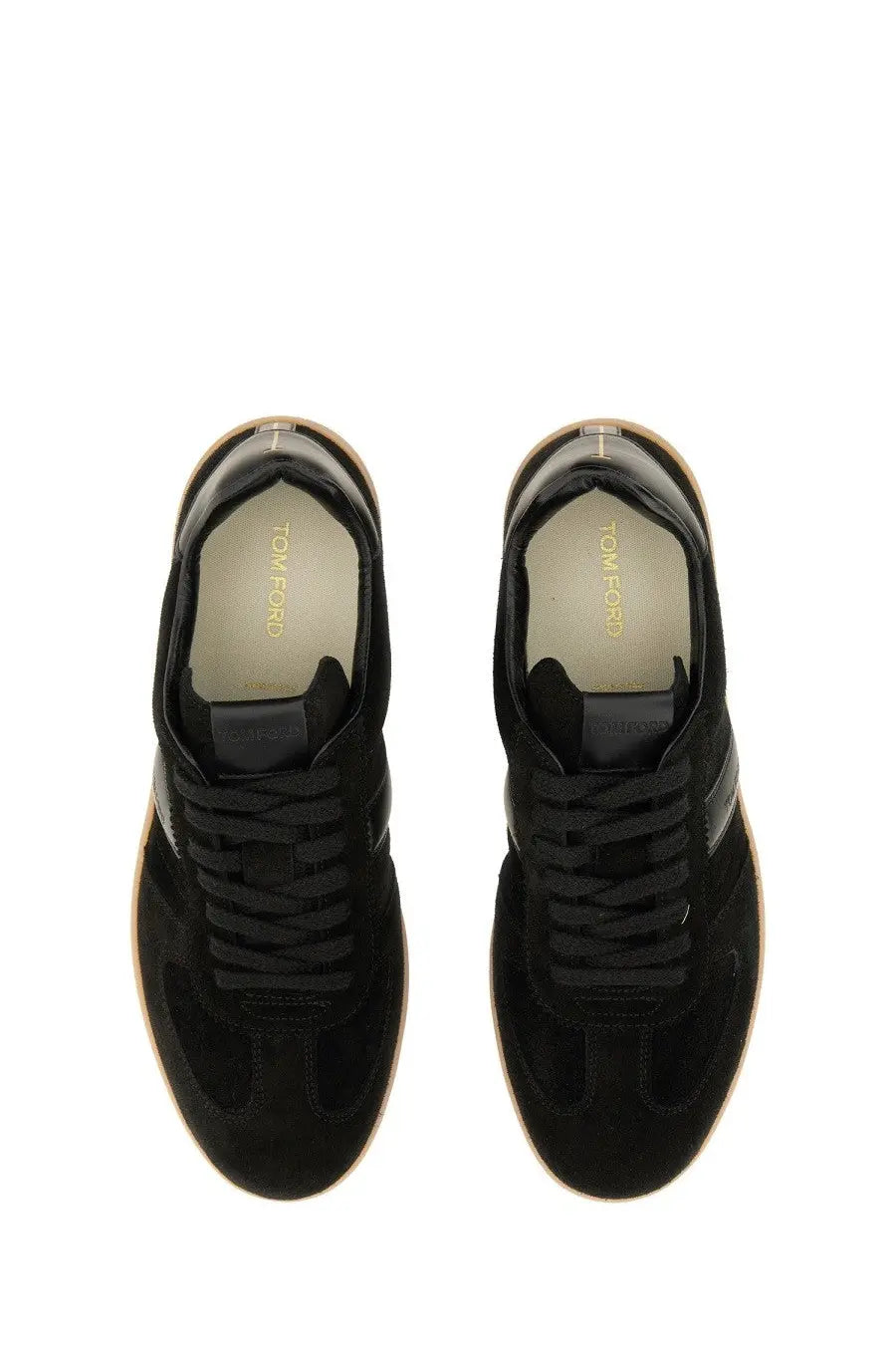 Tom ford men’s leather sneaker black in black suede with tan rubber soles and a minimalist design