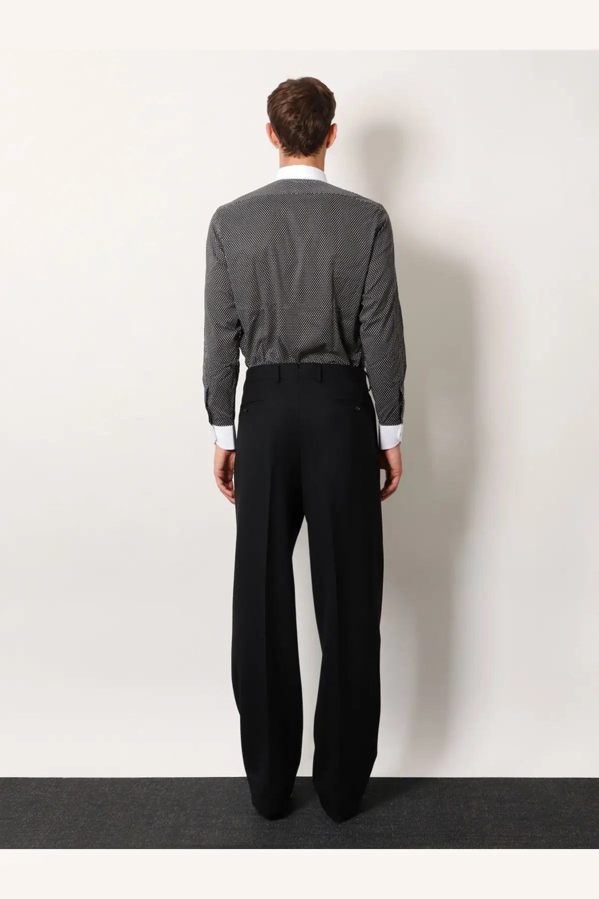 Black tailored trousers with a sleek straight leg cut paired with tom ford men’s microfantasy cotton shirt black
