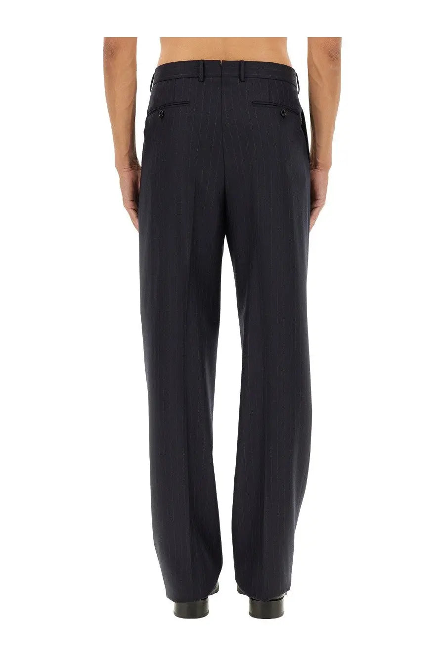 Dark navy wool tom ford men pinstripe pants with tailored fit and subtle pleats at the back side