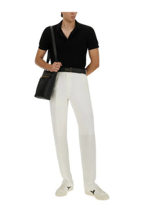 Black leather crossbody bag with gold-tone hardware from tom ford men’s pique polo black collection
