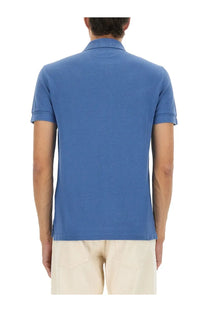 Tom Ford men’s blue short-sleeved pique polo shirt with ribbed collar and cuffs made of cotton blend fabric