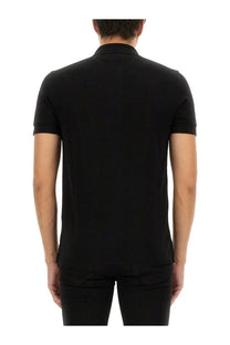 Tom Ford men’s black piquet polo shirt with short sleeves classic collar and ribbed cuffs