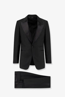 Tom Ford men’s Shelton stretch wool tuxedo black with satin lapels and matching tailored trousers