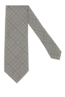 Tom Ford men’s silk tie in beige with a classic black and white houndstooth pattern and sharp tailored cut