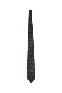 Tom Ford men’s silk tie in black with subtle white polka dots and grey tones for formal occasions