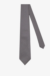 Tom Ford men’s silk tie in classic black and white houndstooth pattern with grey tones