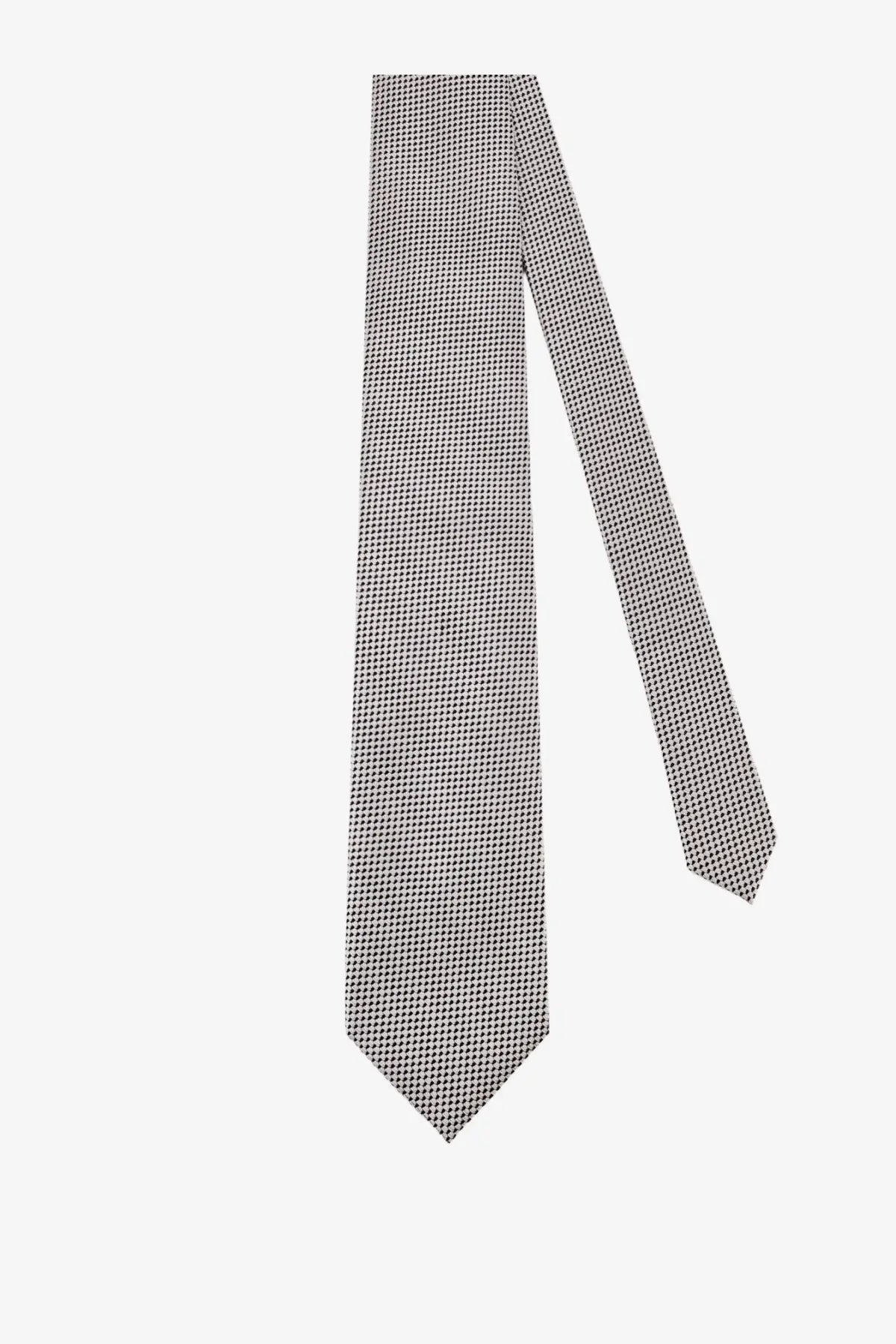 A tom ford men’s silk tie in silver with a sleek gray color and subtle repeating dot pattern