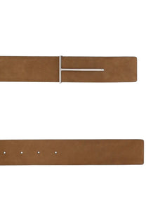 Tom Ford men’s slim beige leather belt with tan strap and sleek silver t-shaped buckle front view