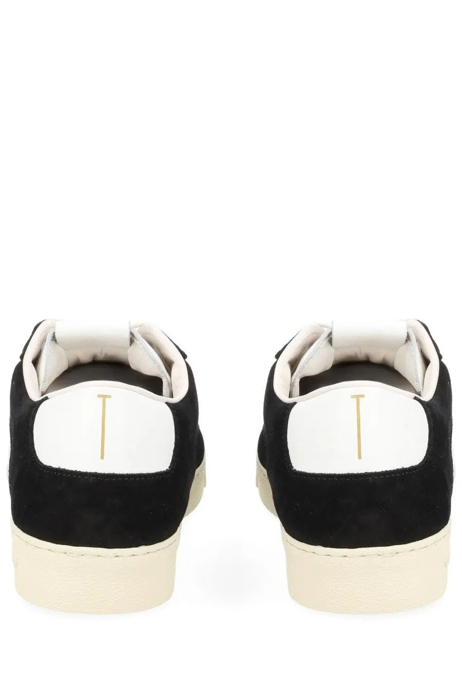 Black suede low-top tom ford men’s sneaker with white rubber sole and white heel tab featuring gold vertical line logo
