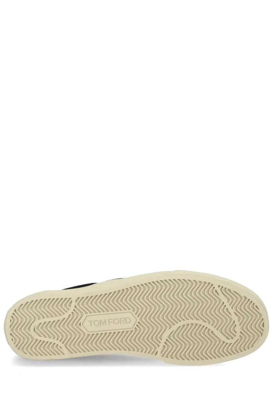Cream-colored rubber sole with wavy tread and tom ford logo on tom ford men’s sneaker jude black
