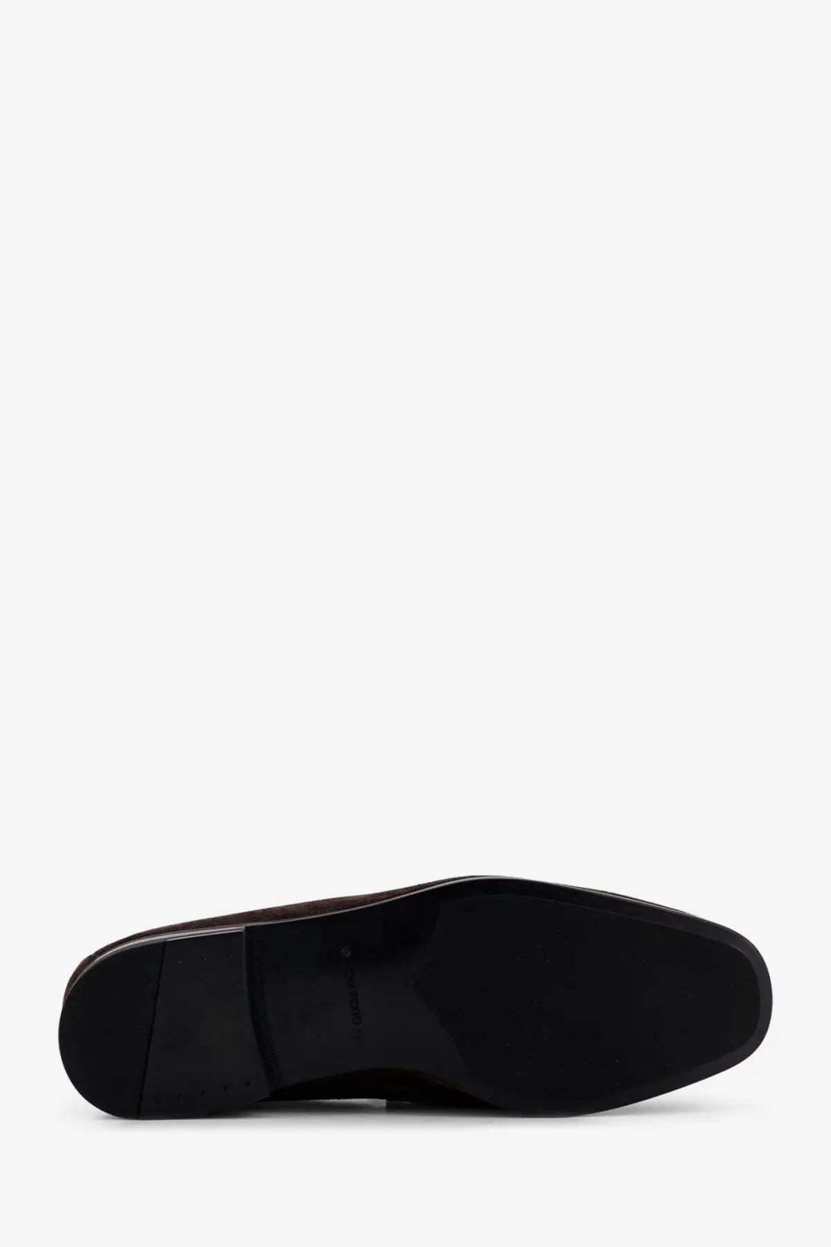 Black leather oxford shoe with sleek polished finish and subtle heel shown from the back side in tom ford men’s suede loafers brown product image