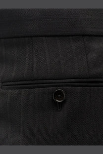 Tom Ford men’s black wool trousers with pinstripe texture and matching black button detailing