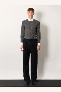 Tom Ford men’s black wool trousers with a sleek tailored fit and pleated design