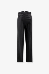 Black tom ford men’s wool trousers with a sleek straight-leg cut and subtle stitching details