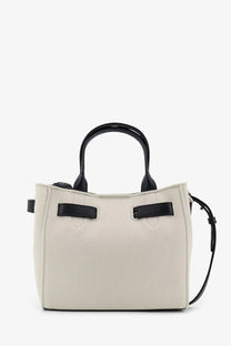 Tom ford women’s Audrey canvas handbag cream-colored textured tote with black leather handles and strap minimalist design