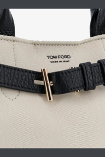 Tom Ford women’s Audrey canvas handbag black with black leather strap gold-tone t-bar buckle and made in Italy interior