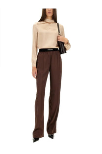Brown wide-leg silk trousers with tailored fit and black tomford waistband from tom ford women’s blue in silk pink collection