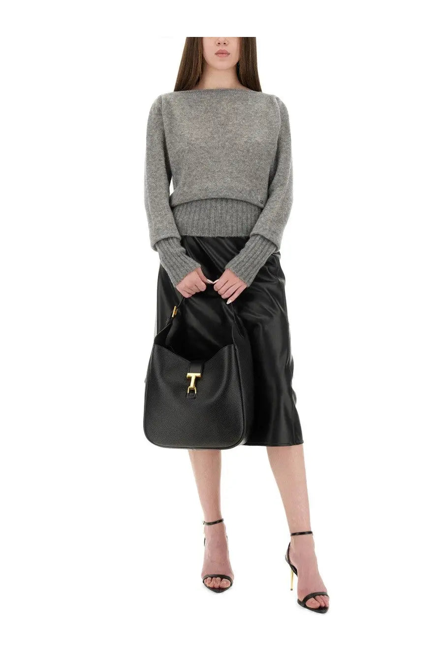 Black leather handbag with gold-tone t-shaped clasp paired with tom ford women’s grey boat neck sweater